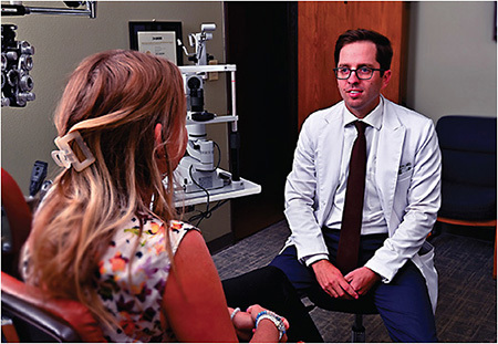 Dr. Henry takes time to discuss test results and answer the patient’s question.